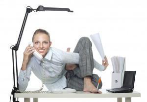 Flexible business woman talk by phone